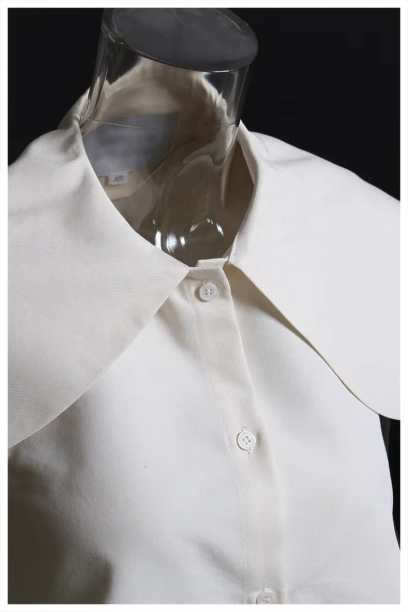 OUDINA Hot Selling Doll Collar Hollow Simple Solid Color Backless Blouse for Women Lady Casual Shirt